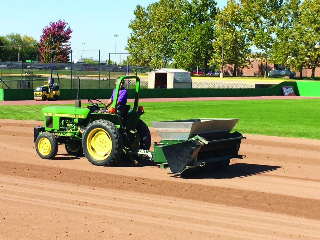 gentleman on machine on field