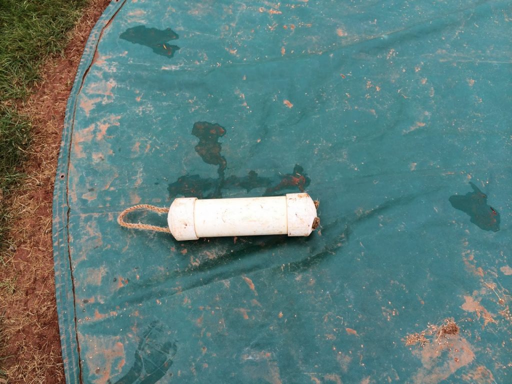 white cap tapped on both sides