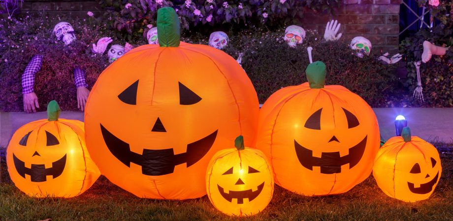 Inflatable pumpkins glowing. Halloween background decoration out