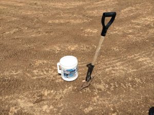 bucket and shovel on infield