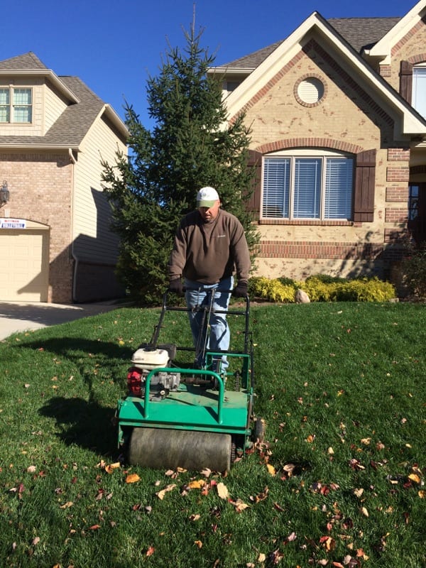 gentleman cutting his grass