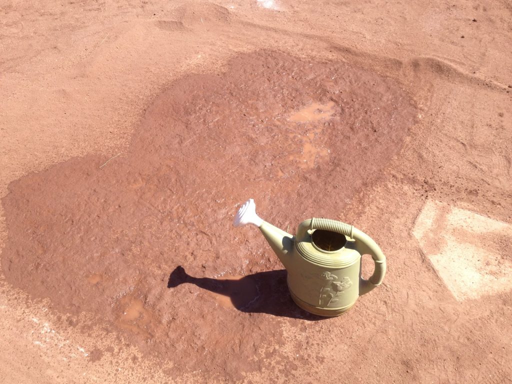 watering can on field