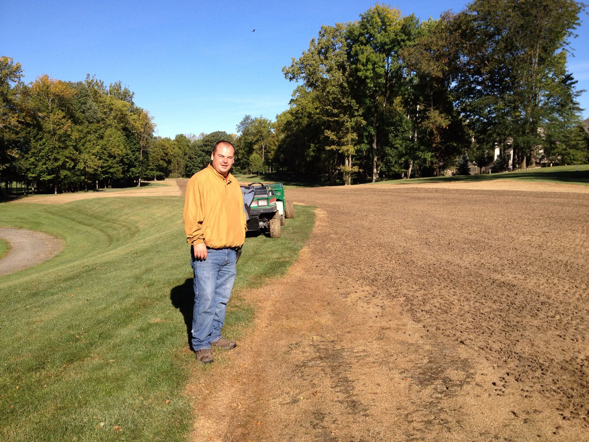 gentleman standing on dirt