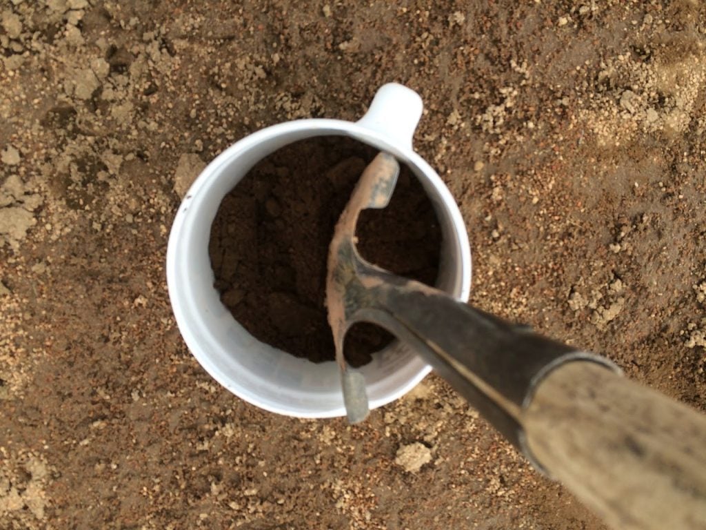 shovel in bucket on infield