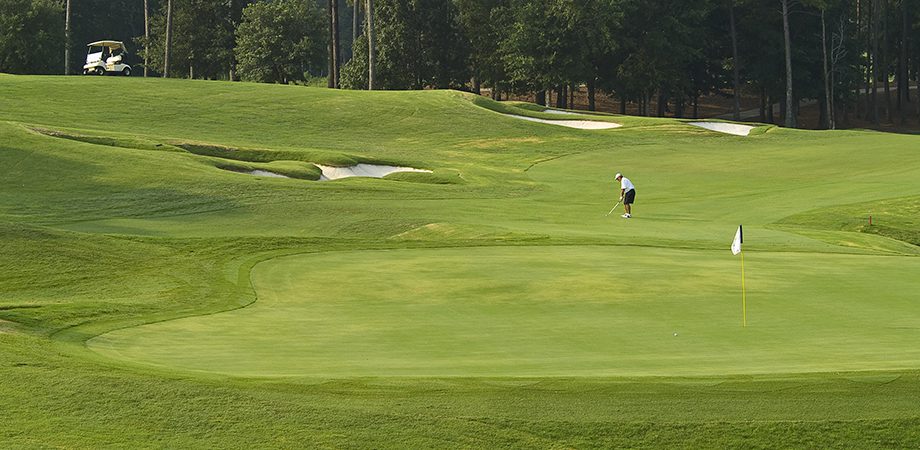 gentleman golfing on golf course