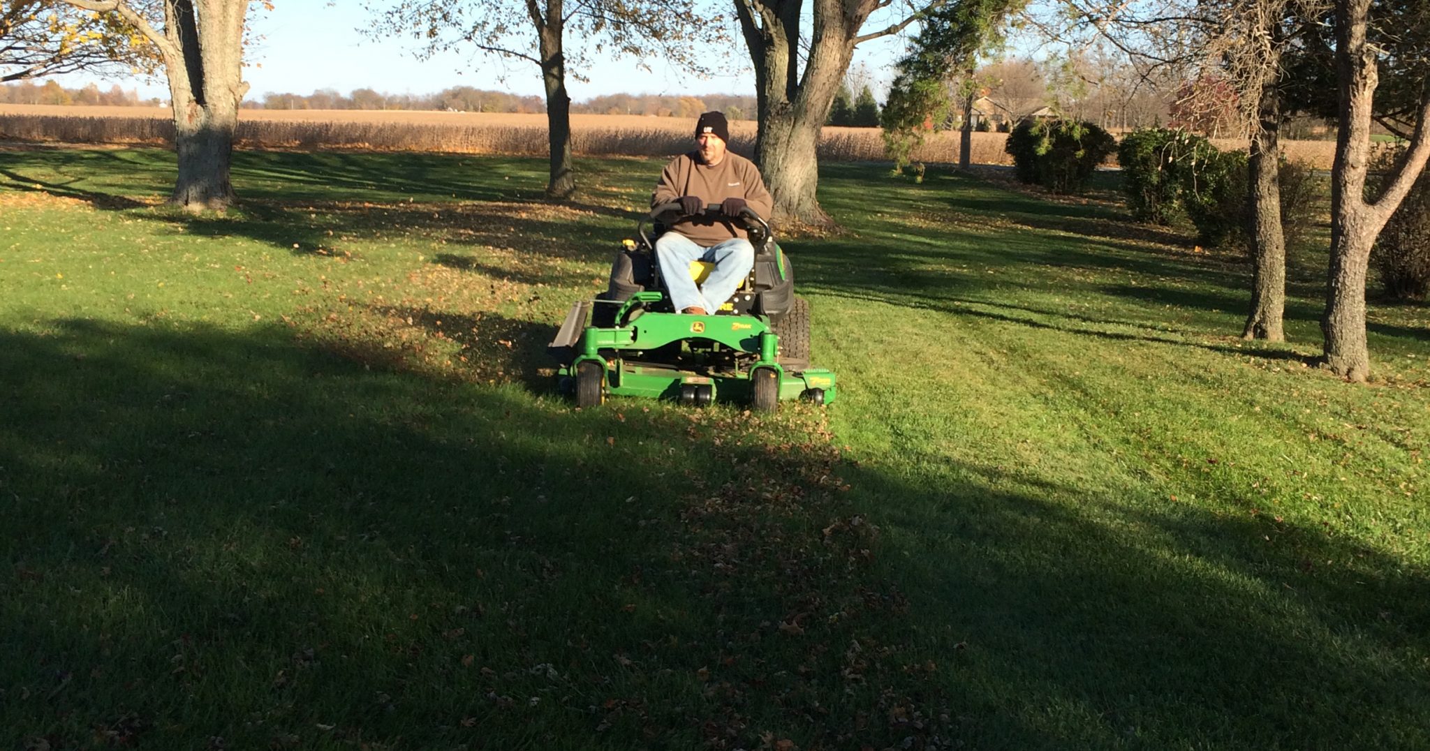 gentleman cutting lawn